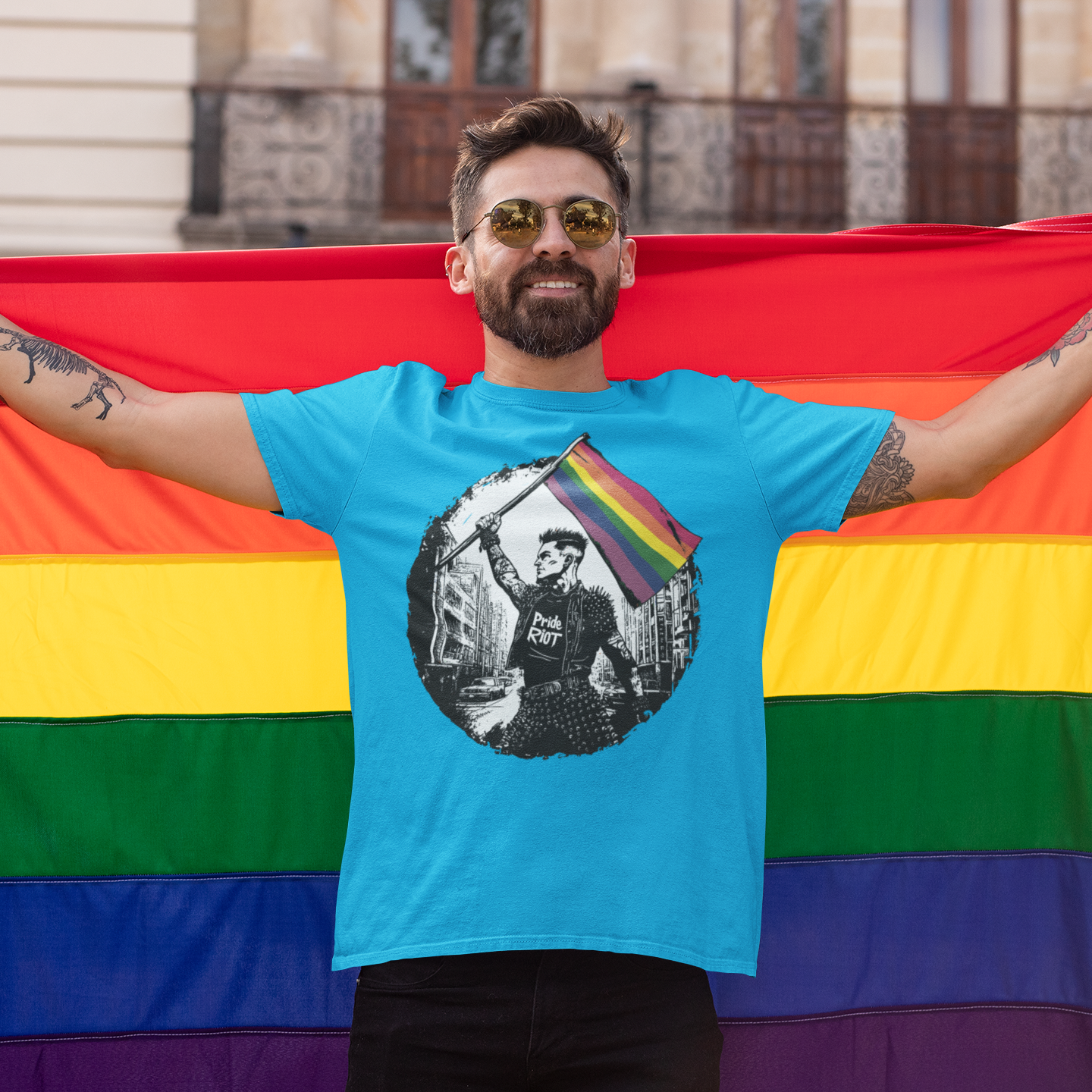 Riot Flagbearer Tee – Queer Punk Protest Shirt – Unisex LGBTQ+ 2025 Pride Graphic by Pride Riot