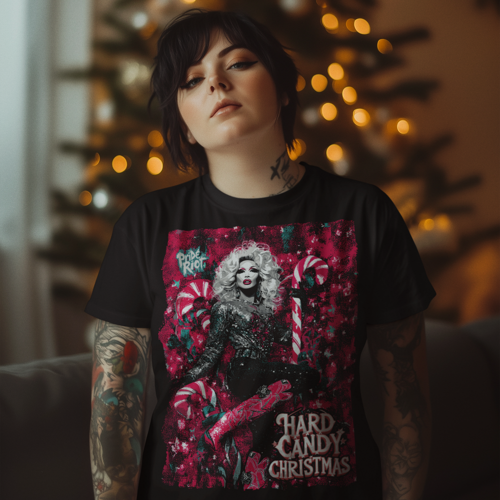 Woman wearing a black Pride Riot holiday tee shirt