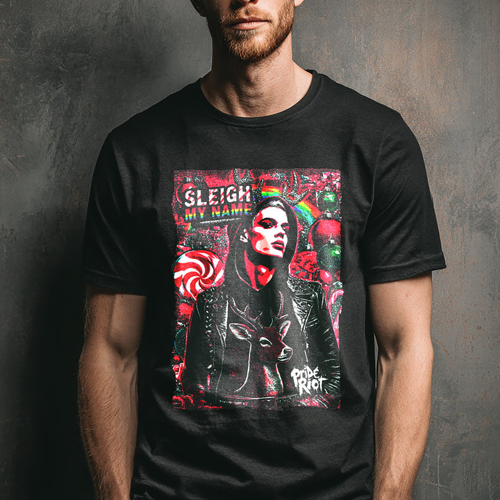 Person wearing a black t-shirt with a colorful graphic design on a dark background