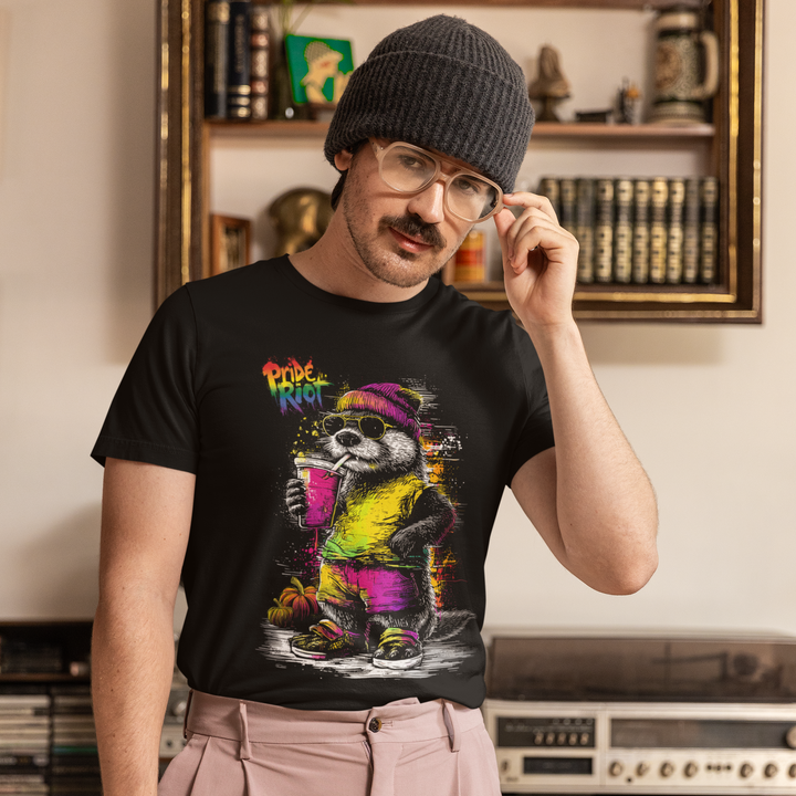 Person wearing a black t-shirt with colorful graphic design in a room with vintage stereo equipment.