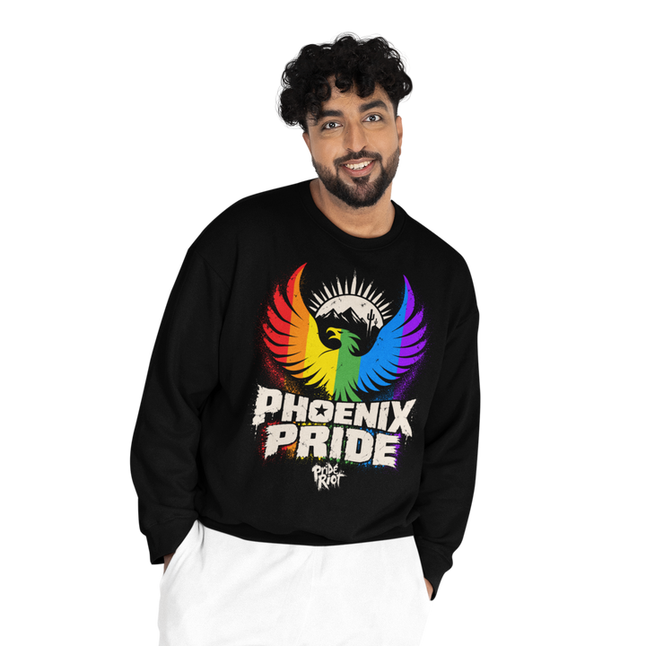 PHX Pride sweatshirt in black, worn, front — rainbow phoenix rising over the desert, Pride Riot®