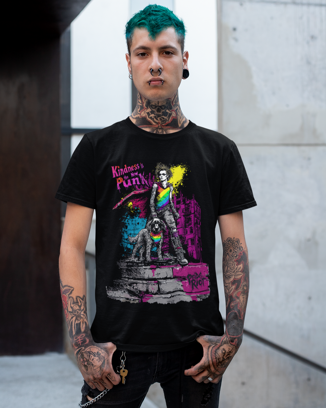Person wearing a black t-shirt with colorful graphic design in an urban setting