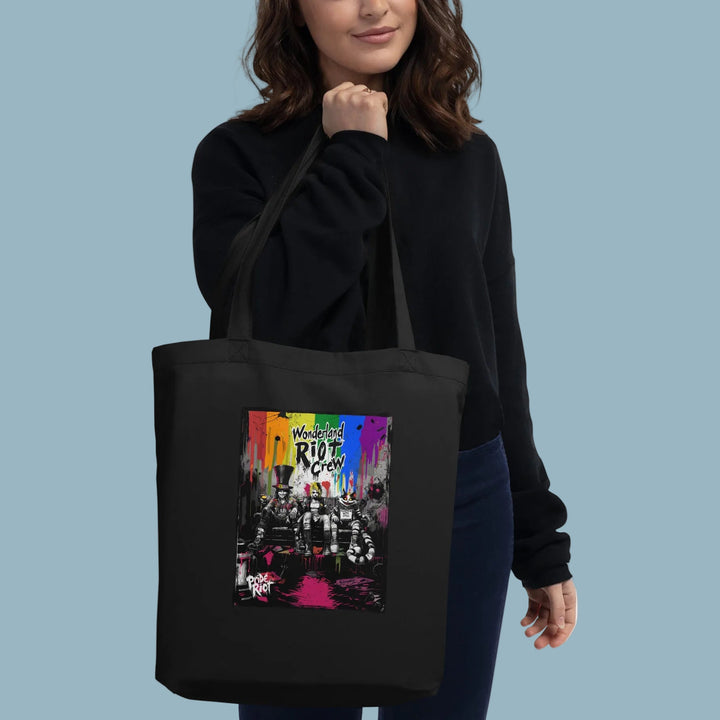Front view of the Alice in Anarchy organic canvas tote bag in black. The bag features a large, high-contrast white print of the distorted Punk Alice graphic.