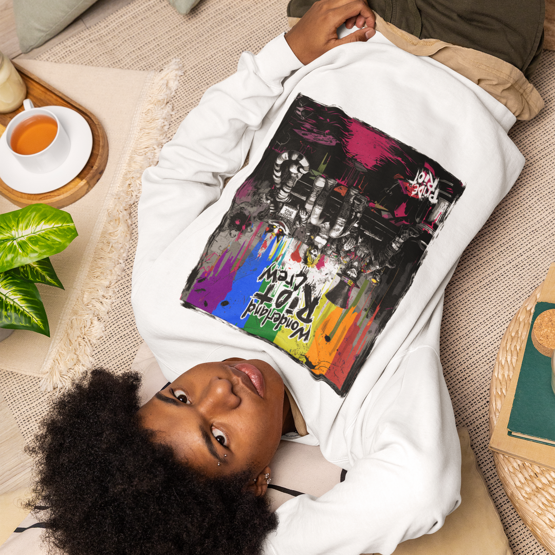 A model wearing the Alice in Anarchy crewneck in White. The sweatshirt has a relaxed, gender-neutral fit that sits loosely on the hips.