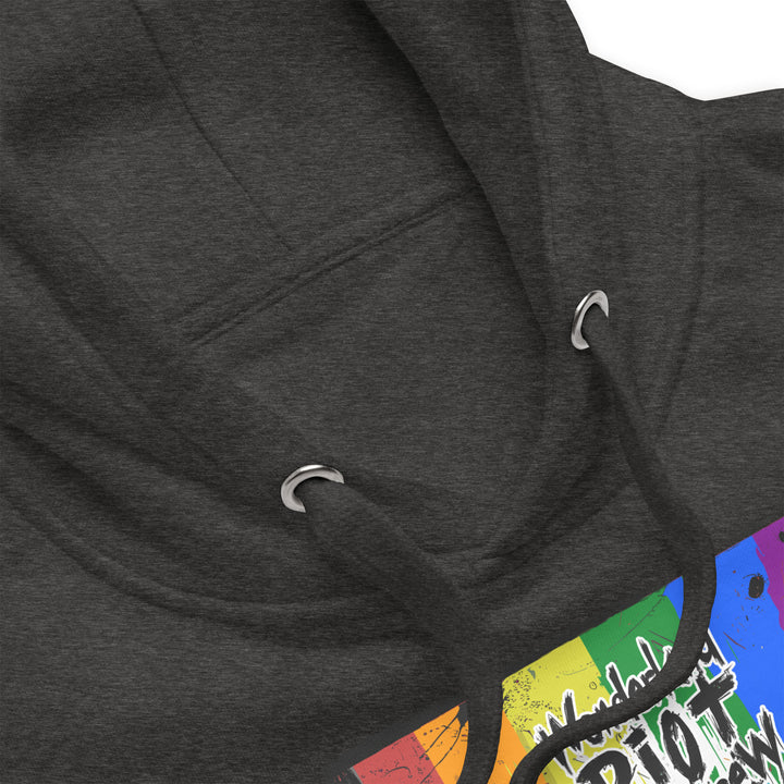 Close-up macro shot of the hoodie's fabric surface and metal eyelet detail. The image highlights the tight weave of the 10oz cotton-blend fleece, conveying warmth and a high-quality, soft texture.