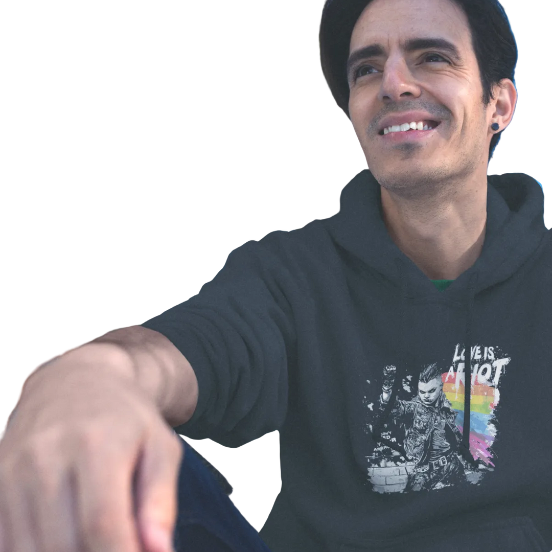 Love is a Riot (Dark) hoodie worn by a model, black — LOVE IS A RIOT lettering over a rainbow paint splash — Pride Riot