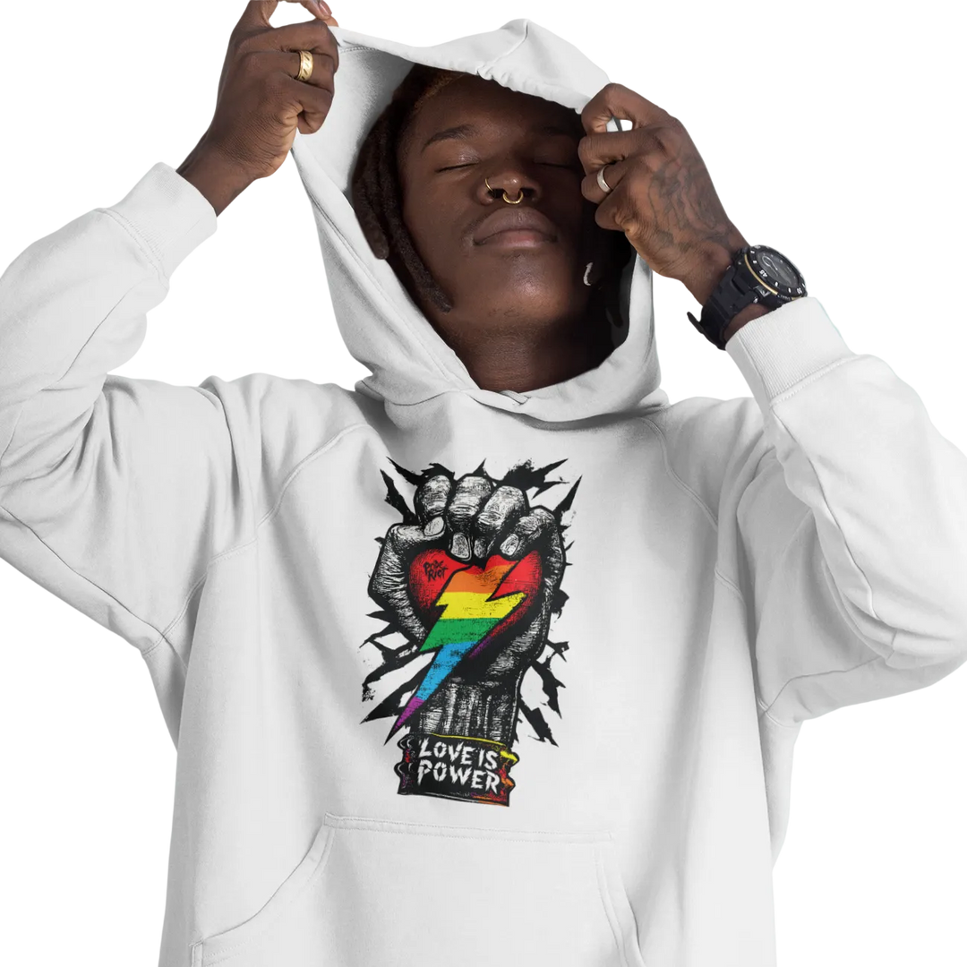 Love is Power (Light) hoodie worn by a model, white — fist breaking through a rainbow heart with LOVE IS POWER on two lines — Pride Riot