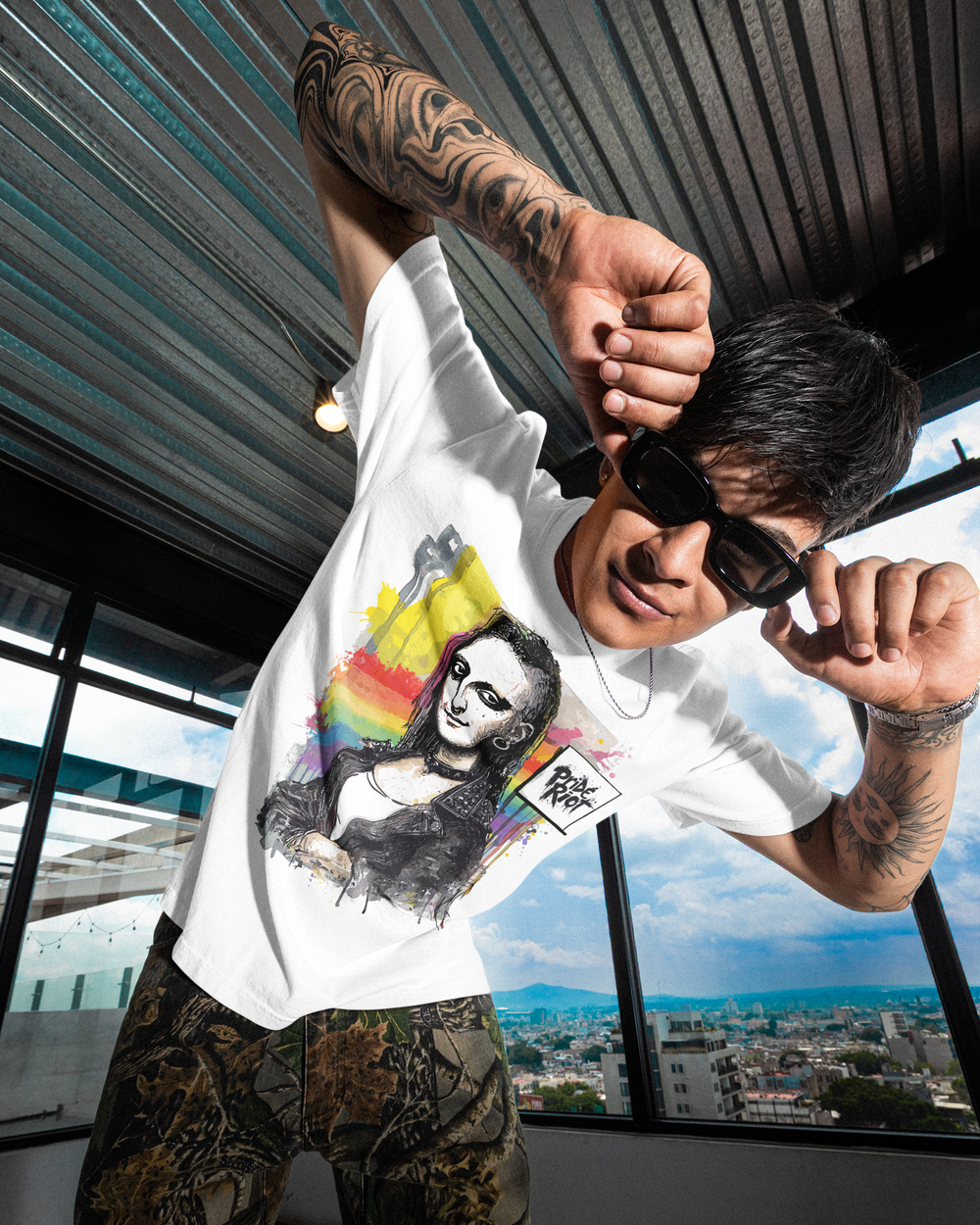 Mona Lisa tee in white, worn — the Mona Lisa in a studded leather jacket over rainbow paint