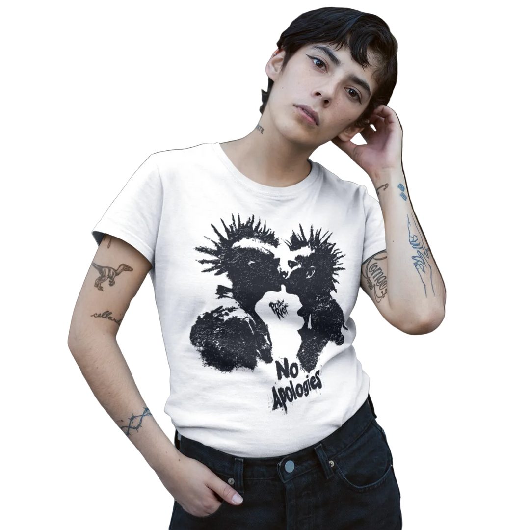 A person wearing a white graphic T-shirt with a black distressed print and the words made by Pride Riot.