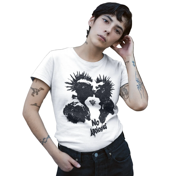 A person wearing a white graphic T-shirt with a black distressed print and the words made by Pride Riot.