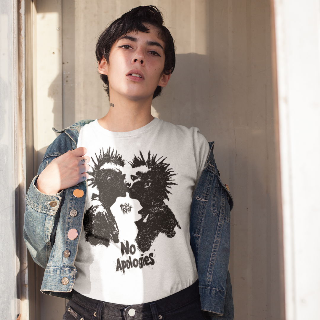 A model wearing a white graphic t-shirt with a black distressed print of two faces made by Pride Riot.