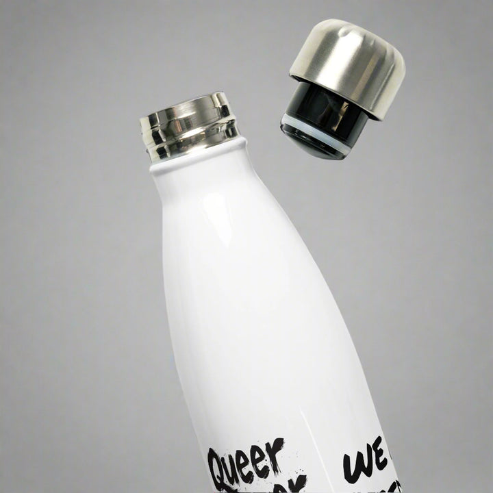 White water bottle with silver cap and black sleeve on a white background