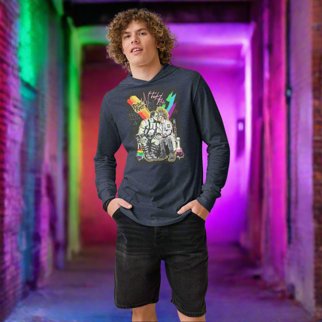 Person wearing a navy blue hoodie with a colorful graphic design 