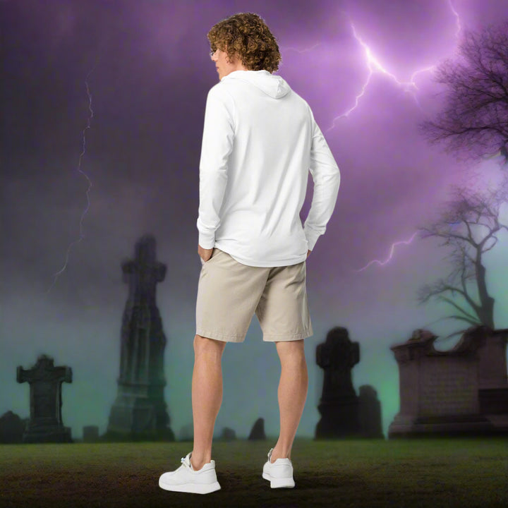 Person wearing a white hoodie and beige shorts